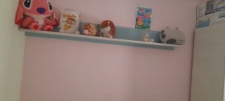 Habitación juvenil con cama nido y armario