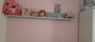 Habitación juvenil con cama nido y armario