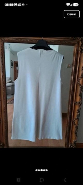 Vestido blanco con bolsillos negros