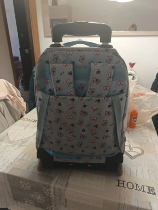 Mochila con ruedas y estampado floral