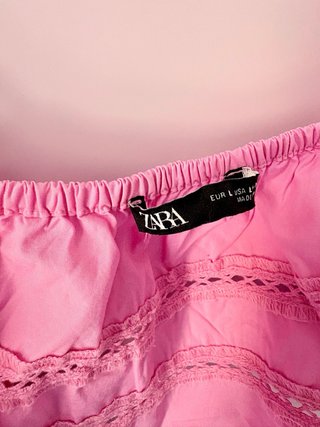 Top Zara rosa con lazada y volantes