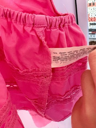 Top Zara rosa con lazada y volantes