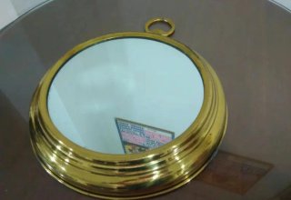 Espejo redondo estilo reloj de bolsillo