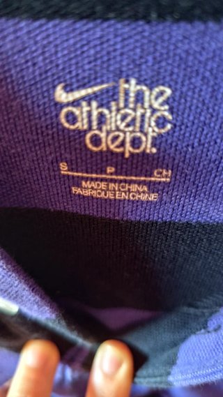 Polo Nike rayas moradas y negras