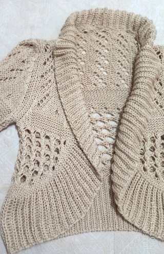 Capispalla beige traforato