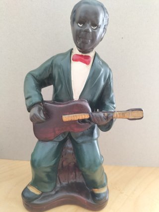 Figura músico blues con guitarra