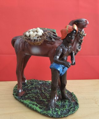 Figura artesanal portador mexicano