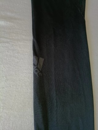 Leggings Adidas neri con inserti in mesh
