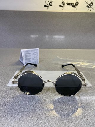 Gafas de sol redondas plateadas