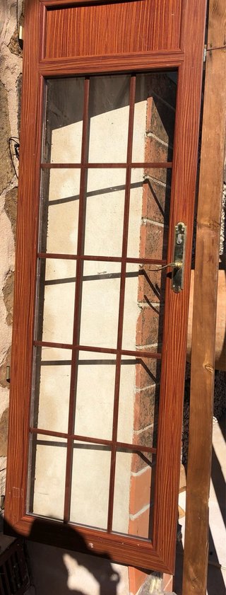 Puerta de salón de aluminio de efecto madera