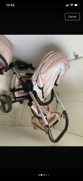 Carro de bebé rosa