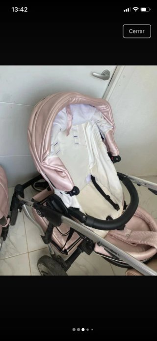 Carro de bebé rosa