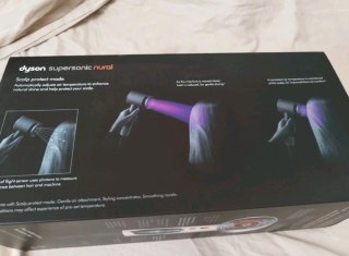 Dyson Supersonic nural rosa y blanco