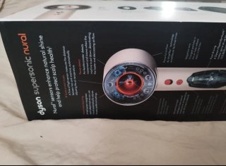 Dyson Supersonic nural rosa y blanco