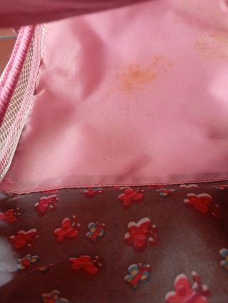 Carro gemelar de juguete rosa