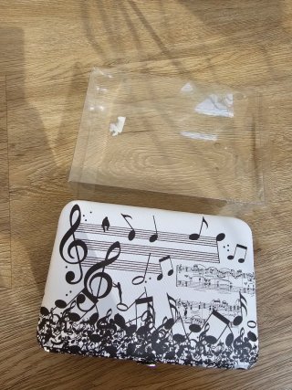 Joyero con notas musicales
