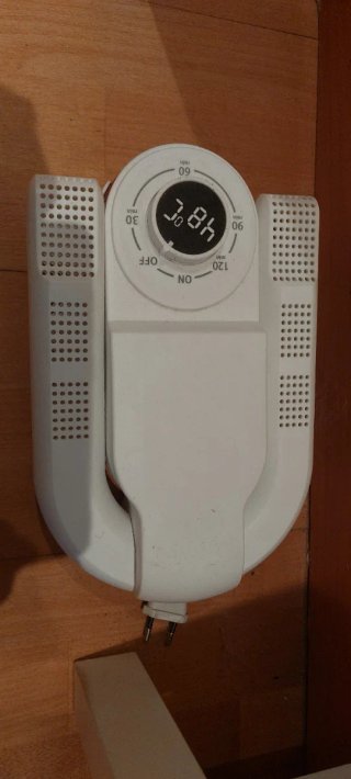 Secador de zapatos eléctrico blanco sin usar.