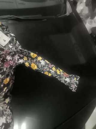 Blusa estampada floral manga larga