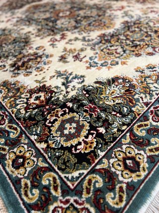 Alfombra de lana beige y multicolor