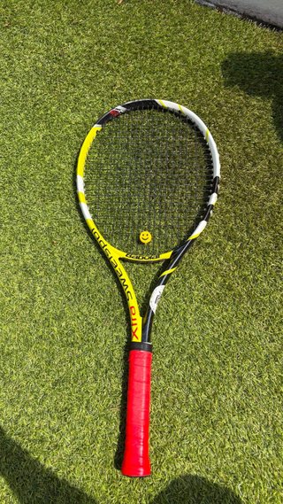 Raqueta Babolat amarilla y negra