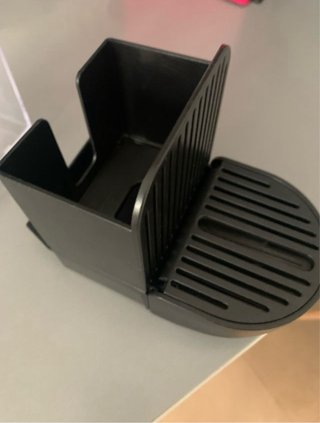 Recipiente Nespresso para cápsulas.
