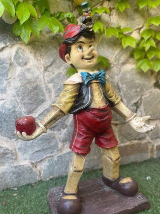 Figura de Pinocho con Pepito Grillo