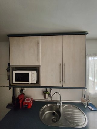 Muebles de cocina beige y azul