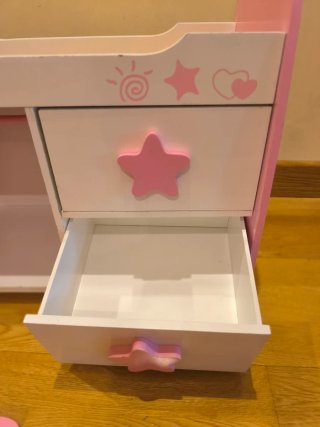 Cuna de muñecos de madera rosa