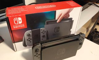 Nintendo Switch+MicroSD 128GB + Maletas+FIFA