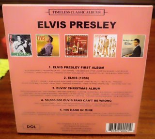 Lote Elvis: 5 CD's + Botella Whiskey Vacía y Púa.