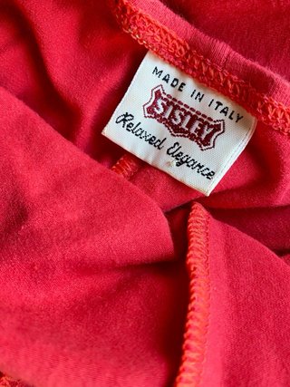 Tuta Sisley donna scollata rosso corallo