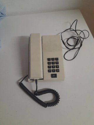Teléfono de mesa retro beige