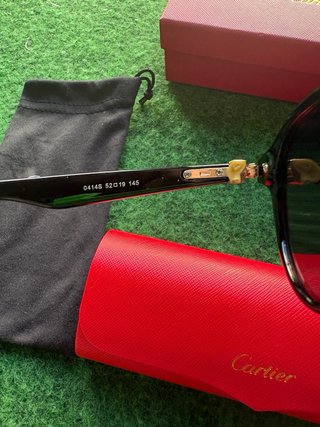 Gafas de Sol Cartier 0414S Negras y Doradas