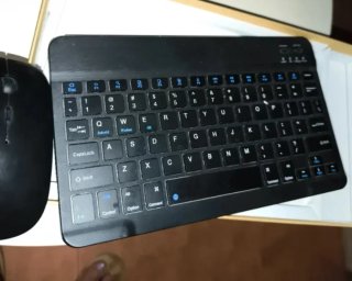 Tablet con teclado casi nueva URGE VENTA