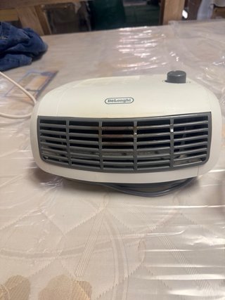 Calefactor DeLonghi Blanco y Gris
