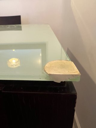 Mesa de comedor grande de cristal y madera