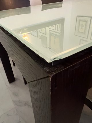 Mesa de comedor grande de cristal y madera