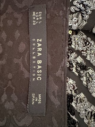 Falda corta lentejuelas negra y plateada