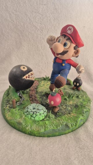 Pack Super Mario: Gioco originale Wii + figura