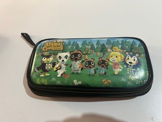 Nintendo Switch Lite Coral + Funda Animal Crossing