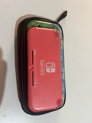 Nintendo Switch Lite Coral + Funda Animal Crossing