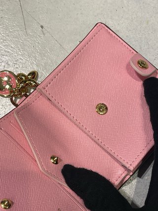 Cartera Louis Vuitton Monogram con Charm