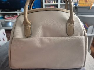 Neceser de viaje Samsonite beige y dorado