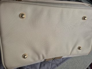 Neceser de viaje Samsonite beige y dorado