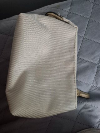 Neceser de viaje Samsonite beige y dorado