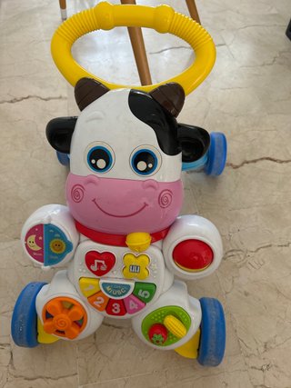 Andador bebé vaca musical