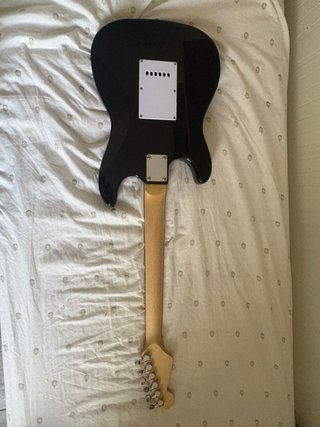 Guitarra Eléctrica con amplificador y cableado