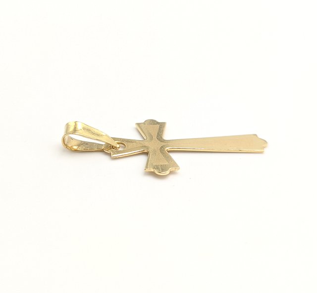 Colgante Cruz de oro de 18k, 0.74 g.