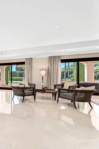 Elegante 4 sillones de ratán con cojines con mesa