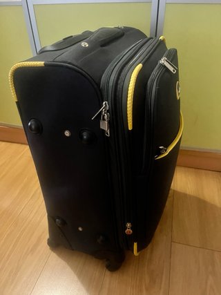 Maleta de viaje 4 ruedas negra y amarilla